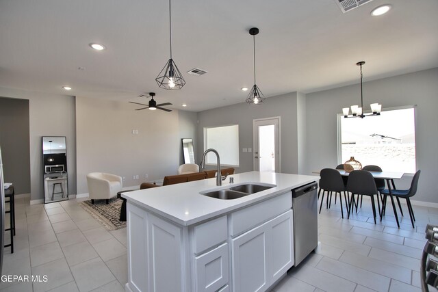 15237 Gauge Ct, El Paso, TX 79938 - kitchen with a sink, light tile patterned floors, stainless steel dishwasher, and visible vents
