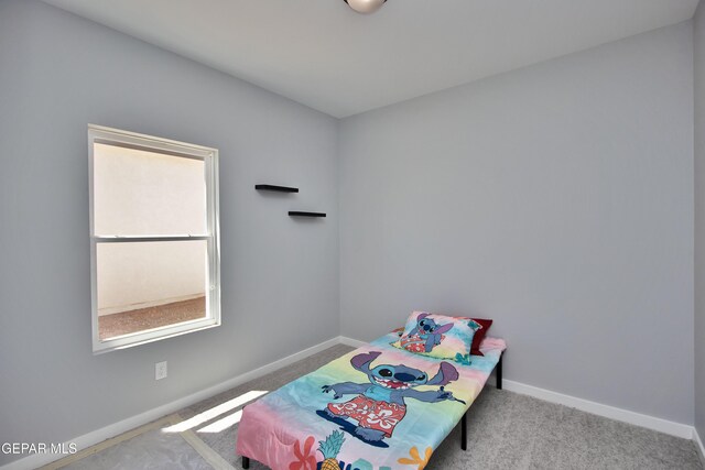 15237 Gauge Ct, El Paso, TX 79938 - carpeted bedroom with baseboards