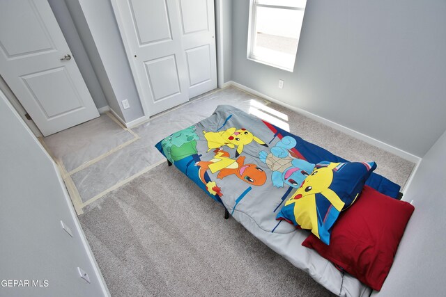 15237 Gauge Ct, El Paso, TX 79938 - carpeted bedroom featuring baseboards and a closet