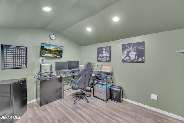 home office with baseboards, vaulted ceiling, recessed lighting, and wood finished floors
