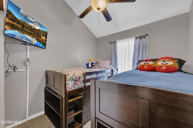 carpeted bedroom with baseboards, a ceiling fan, and lofted ceiling