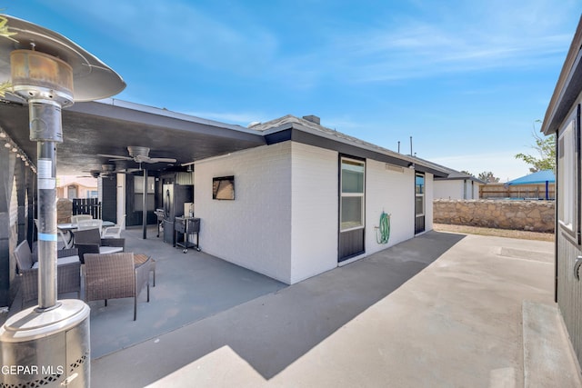 view of patio / terrace featuring outdoor dining space and ceiling fan