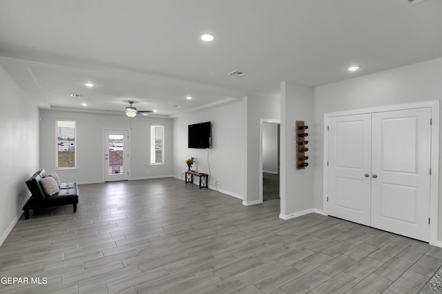 13408 Emerald Glass Dr, Horizon City, TX 79928 - unfurnished room with a ceiling fan, baseboards, light wood-style flooring, and recessed lighting