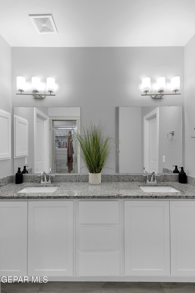 13408 Emerald Glass Dr, Horizon City, TX 79928 - bathroom featuring double vanity