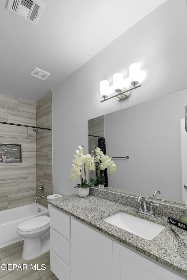 13408 Emerald Glass Dr, Horizon City, TX 79928 - bathroom with toilet, vanity, and shower / bath combination