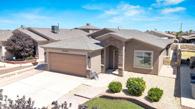 single story home with a shingled roof, an attached garage, stone siding, stucco siding, and concrete driveway