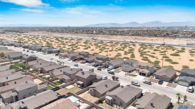 drone / aerial view with a residential view and a mountain view