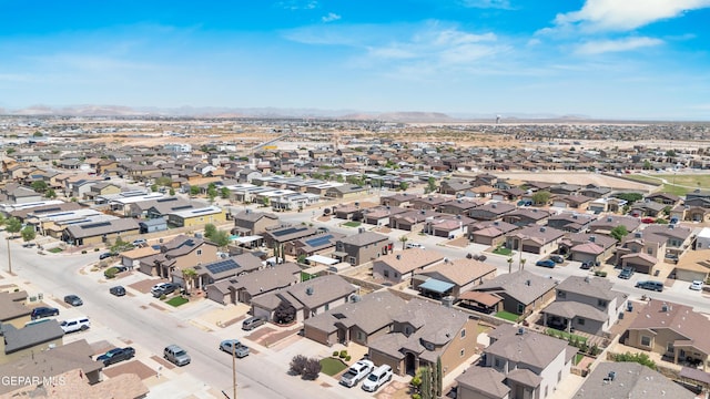 bird's eye view featuring a residential view and a mountain view