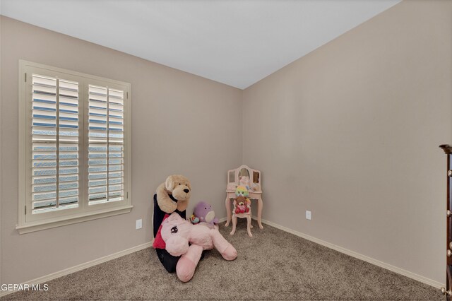 rec room with baseboards, carpet, and a wealth of natural light