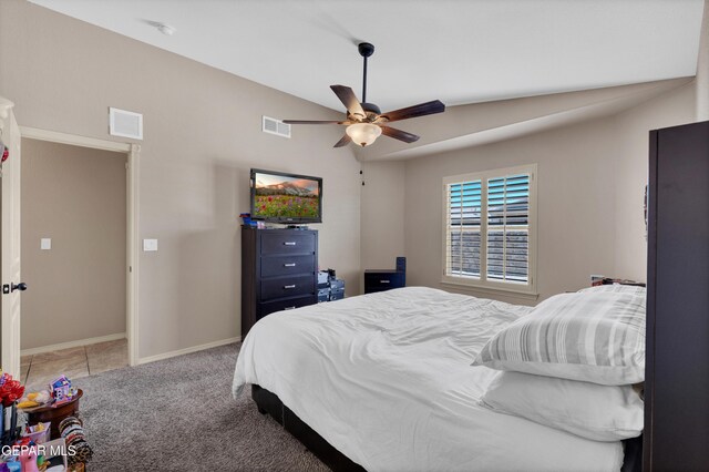 carpeted bedroom featuring visible vents, baseboards, and ceiling fan