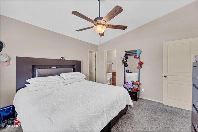 carpeted bedroom with a ceiling fan, baseboards, and lofted ceiling