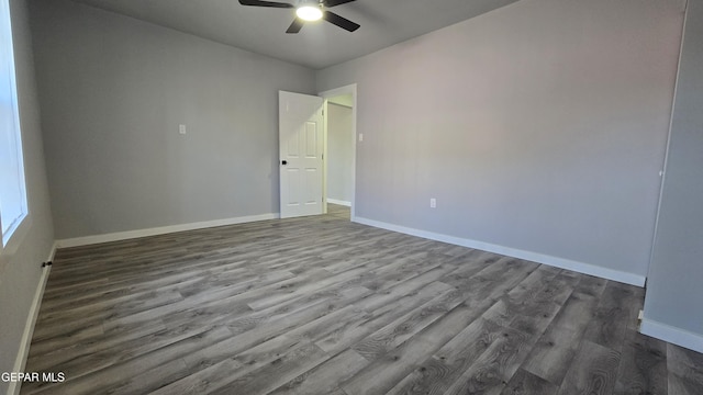 209 Hardesty Pl Unit 1 & 2, El Paso, TX 79905 - empty room featuring ceiling fan, dark wood-style floors, and baseboards