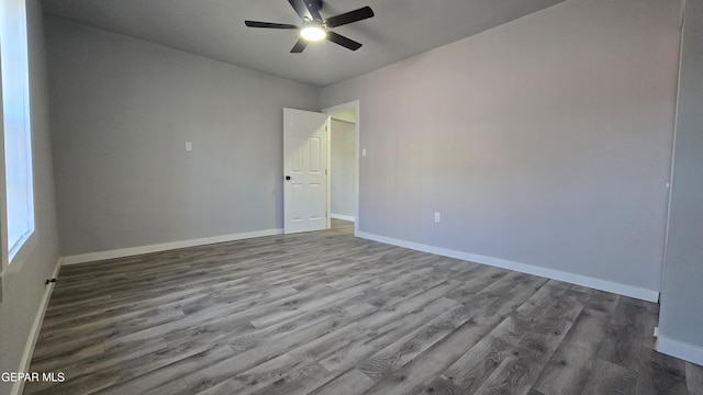 209 Hardesty Pl Unit 1 & 2, El Paso, TX 79905 - spare room featuring a ceiling fan, wood finished floors, and baseboards