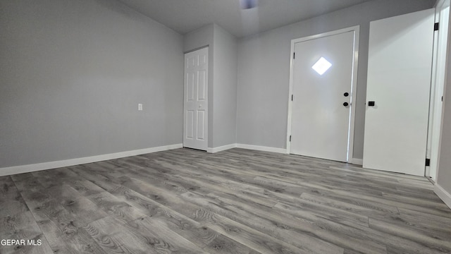 209 Hardesty Pl Unit 1 & 2, El Paso, TX 79905 - foyer featuring wood finished floors and baseboards