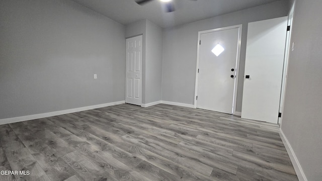 209 Hardesty Pl Unit 1 & 2, El Paso, TX 79905 - entrance foyer with wood finished floors, a ceiling fan, and baseboards