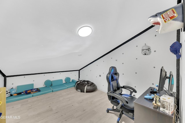 unfurnished office featuring wood finished floors