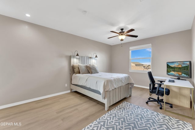 bedroom featuring baseboards, a ceiling fan, light wood-style flooring, and recessed lighting