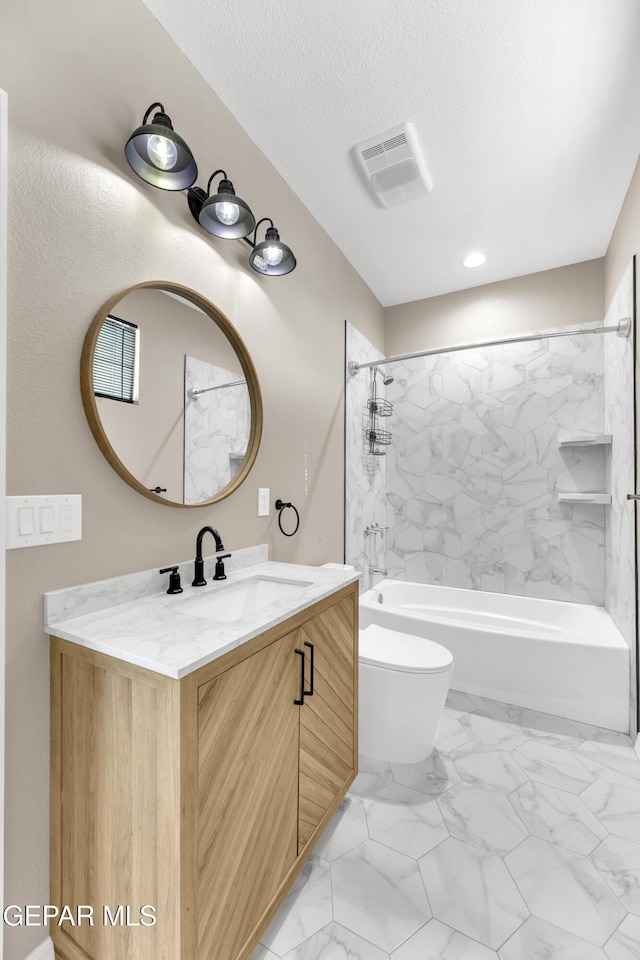 bathroom featuring washtub / shower combination, vanity, toilet, a textured ceiling, and visible vents