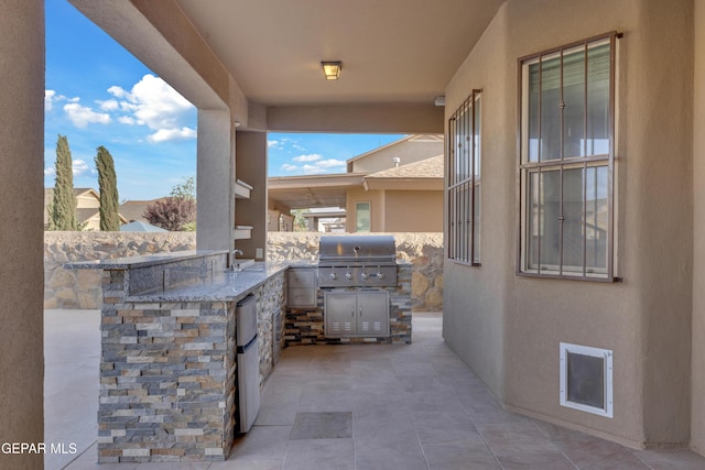 view of patio / terrace with a grill and area for grilling