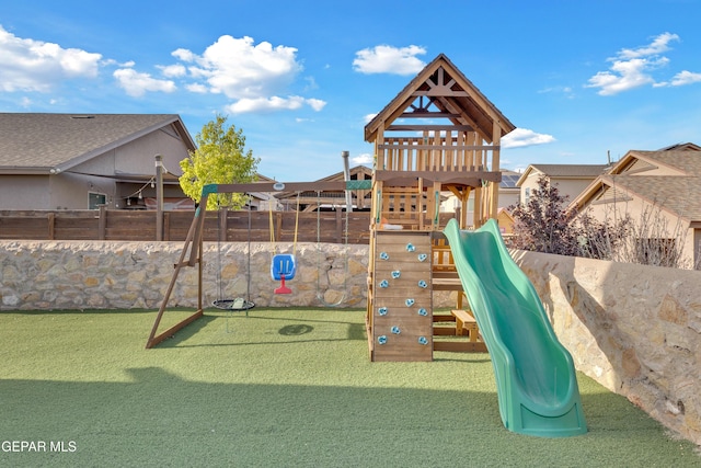 view of play area featuring fence