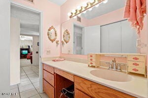 1421 Monte Negro Dr, El Paso, TX 79935 - bathroom featuring visible vents, tile patterned flooring, and vanity