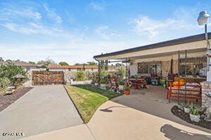 1421 Monte Negro Dr, El Paso, TX 79935 - view of patio / terrace featuring a gate