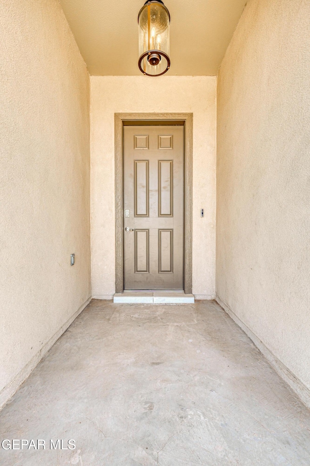 14940 Tierra Escape Ave, El Paso, TX 79938 - doorway to property featuring stucco siding