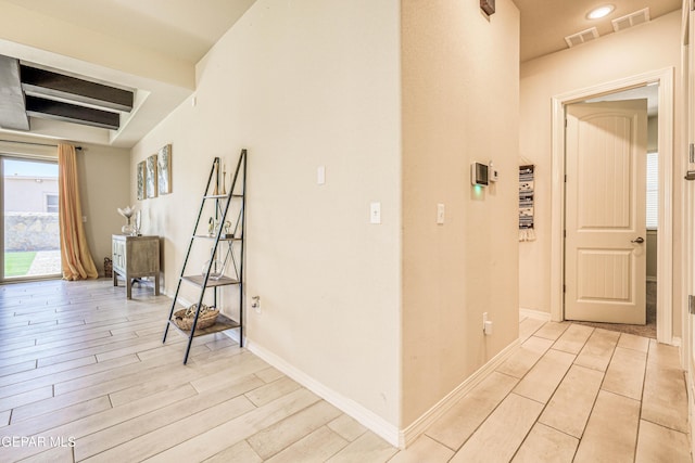 14940 Tierra Escape Ave, El Paso, TX 79938 - hallway with visible vents, light wood finished floors, and baseboards