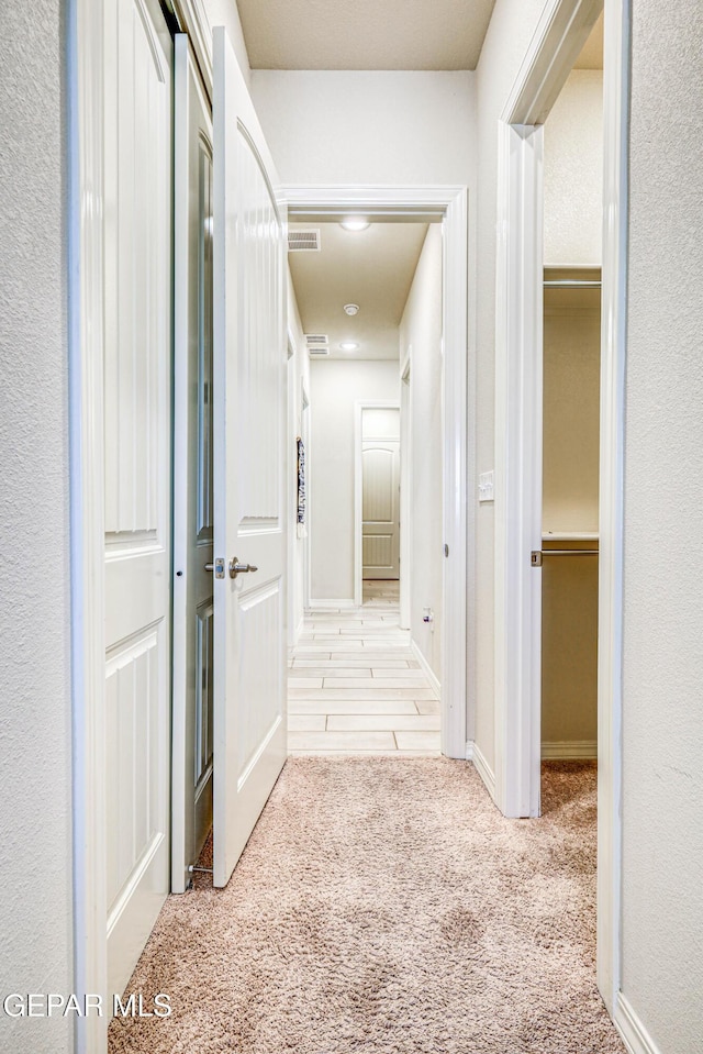 14940 Tierra Escape Ave, El Paso, TX 79938 - hallway featuring visible vents and light colored carpet