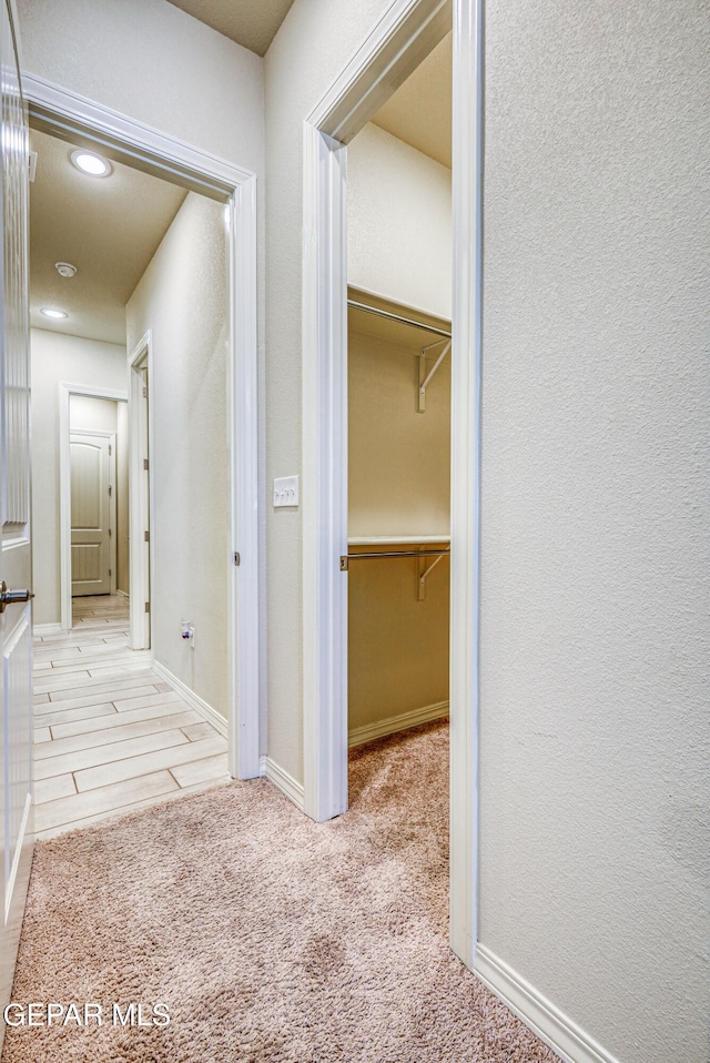 14940 Tierra Escape Ave, El Paso, TX 79938 - hall with recessed lighting, baseboards, and light colored carpet