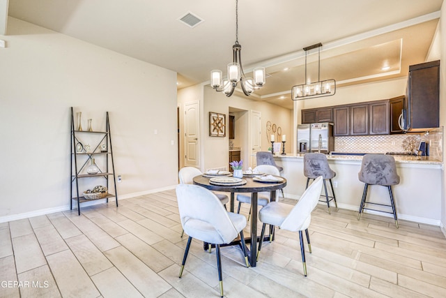 14940 Tierra Escape Ave, El Paso, TX 79938 - dining area featuring recessed lighting, visible vents, an inviting chandelier, and light wood-type flooring