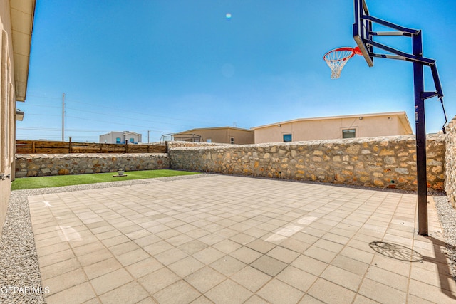 14940 Tierra Escape Ave, El Paso, TX 79938 - view of sport court with a fenced backyard and basketball hoop