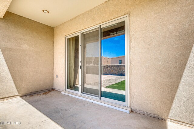 14940 Tierra Escape Ave, El Paso, TX 79938 - property entrance featuring a patio and stucco siding