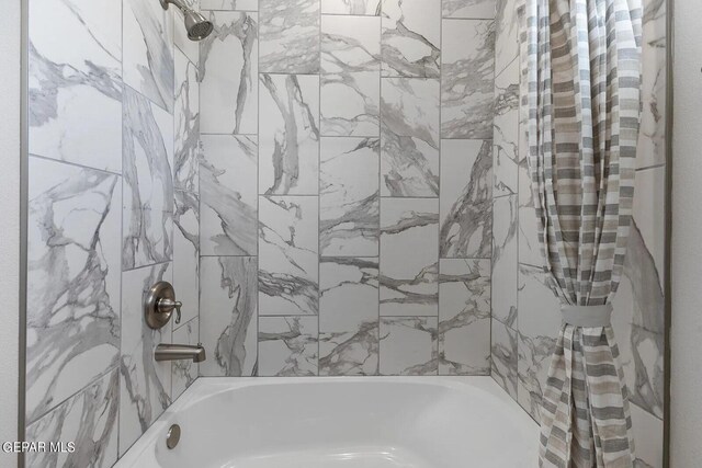 full bath with shower / bathing tub combination