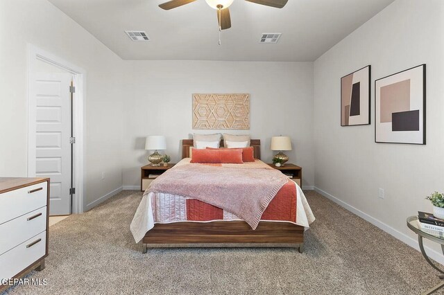 bedroom with a ceiling fan, baseboards, visible vents, and light carpet