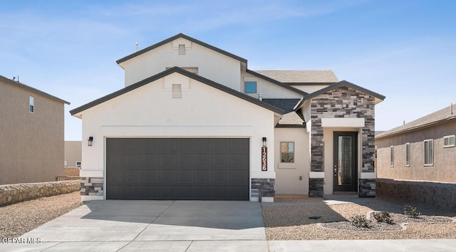 view of front of property with a garage, driveway, stone siding, and stucco siding