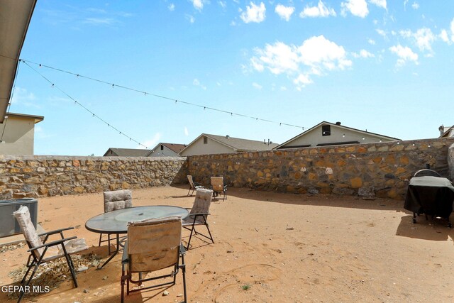 view of patio / terrace with a fenced backyard and outdoor dining space