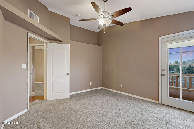 unfurnished bedroom with ceiling fan, visible vents, carpet floors, baseboards, and access to outside