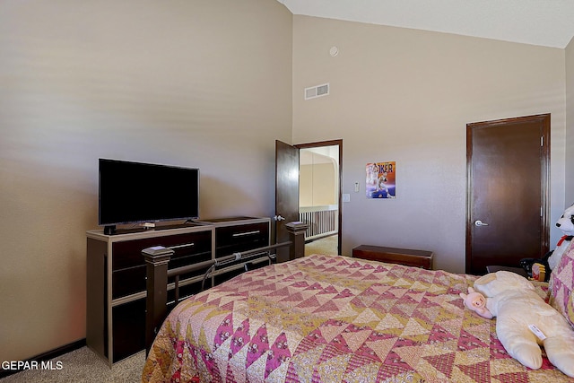 12541 Setting Sun Dr, El Paso, TX 79938 - bedroom featuring light colored carpet, baseboards, visible vents, and high vaulted ceiling