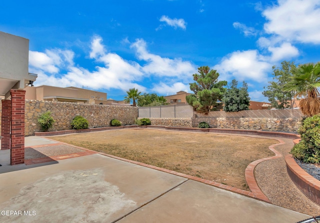 12541 Setting Sun Dr, El Paso, TX 79938 - view of yard featuring a patio and a fenced backyard