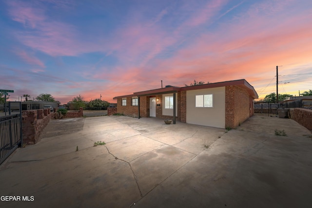 5540 Norwood Ct, El Paso, TX 79924 - rear view of property with brick siding, fence, and a patio