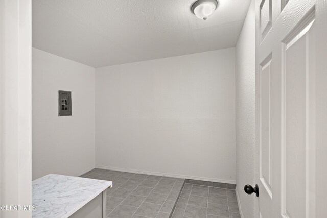 5540 Norwood Ct, El Paso, TX 79924 - clothes washing area featuring light tile patterned floors
