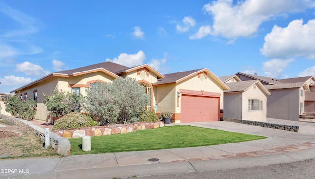 view of front of home with an attached garage, driveway, a front lawn, and stucco siding