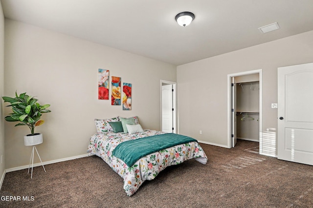 1021 Aerodyne Pl, El Paso, TX 79928 - bedroom with carpet, baseboards, and a spacious closet