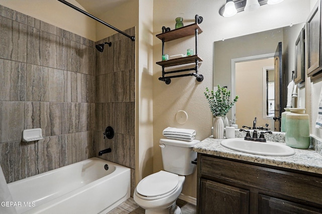 1021 Aerodyne Pl, El Paso, TX 79928 - full bath featuring bathing tub / shower combination, toilet, and vanity