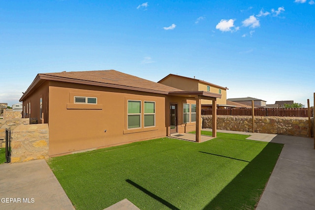 1021 Aerodyne Pl, El Paso, TX 79928 - rear view of house featuring stucco siding, a patio area, and roof with shingles