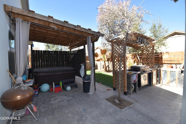 view of patio / terrace featuring a fenced backyard, a pergola, a hot tub, and grilling area