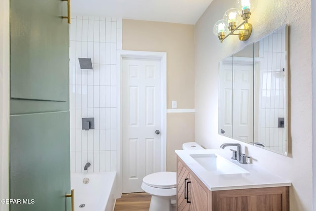 full bath featuring toilet, a notable chandelier, shower / tub combination, and vanity