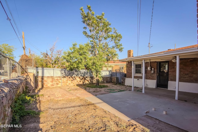 view of yard with a patio and a fenced backyard