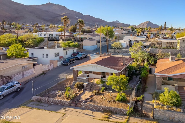 bird's eye view featuring a residential view and a mountain view